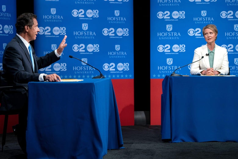 New York Governor Andrew Cuomo answers a question as Democratic New York gubernatorial candidate Cynthia Nixon looks on during a gubernatorial debate at Hofstra University in Hempstead, New York, on August 29, 2018. (Photo by Craig Ruttle / POOL / AFP) (Photo credit should read CRAIG RUTTLE/AFP/Getty Images)